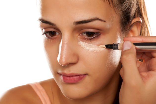 apply concealer to cover dark circle under eye